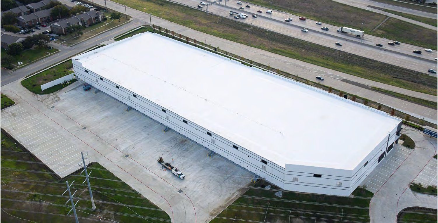 161 Airport Center — high oblique aerial, roof and truck court